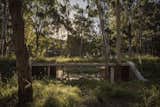 Set on an undulating dune, this dwelling on the coast of Buenos Aires in&nbsp;Argentina by&nbsp;Gonzalo Bardach Arquitectura&nbsp;is comprised of three semi-buried pavilions connected by a lush green roof—offering a moment of architectural poetry within the forest.