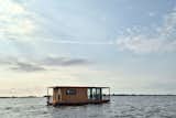 Konga has established an extensive portfolio of Scandinavian-inspired prefab cabins that immerse their occupants in nature. While its latest design retains the builder’s emphasis on environmental sustainability and balancing luxury with minimalism, the Konga Float is the first to move out from forested outposts and onto the water.