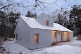 "Unfinished House is a two bedroom, two bathroom 1,400 square foot home in Canada that is a prototype for panelized prefabricated construction with a high-performance envelope," says Workshop Architecture. "Panelized prefab means that instead of being framed on site, the house comes flat-packed on a truck, a jigsaw puzzle of 8-to-16 foot-wide pieces that have the structure, insulation, and vapor barrier all pre-assembled."